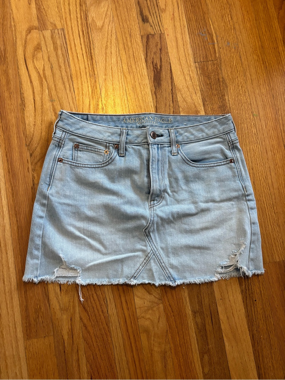American Eagle Outfitters Light Wash Distressed Denim Mini Skirt